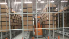 Stockage de semi-finis (10 000 références) au sein du site. Mise en place de chariot filoguidé avec les équipes